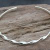 Ribbon Twist Torque Bangle