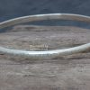 Traditional bangle line hammered 1wm Traditional D-shape bangle - Line hammered