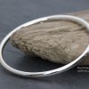 Fully rounded silver bangle