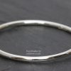 Fully rounded silver bangle