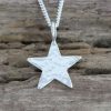Star mini glitter hammered pendant wood wm 1024 Sterling silver glitter hammered mini star pendant