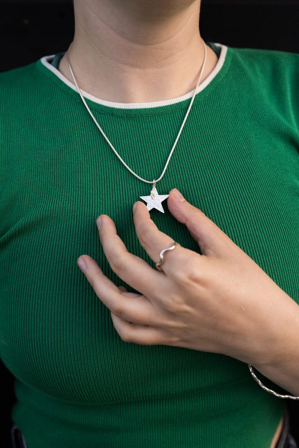 Sterling silver glitter hammered star and pearl pendant with wave ring