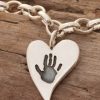 Sterling silver handprint Squishy heart bracelet close up