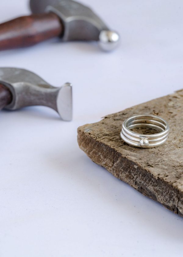 Stacking rings, pebble centrepiece