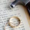 Yellow gold wedding rings on a sentimental book