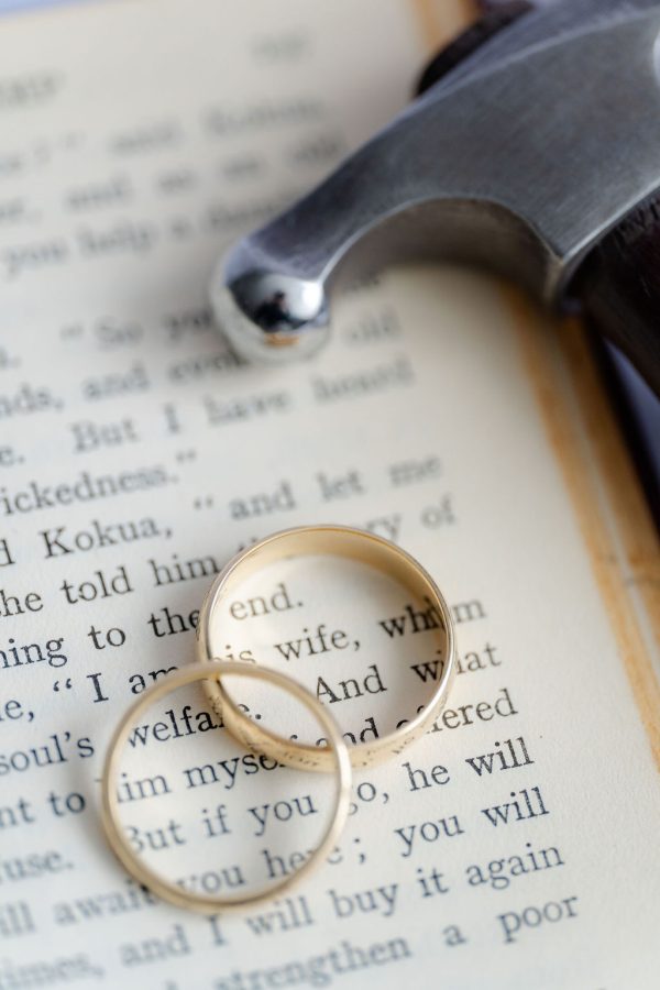 Yellow gold wedding rings on a sentimental book